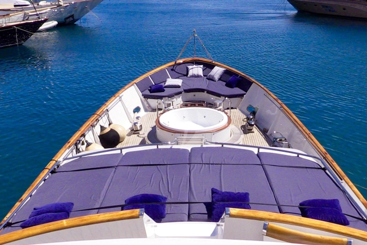 Spacious yacht hospitality deck prepared for a private day on the water