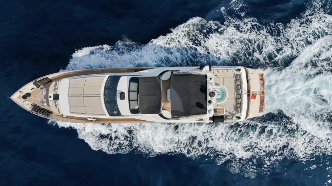 Aerial view of a private motor yacht underway in the Mediterranean
