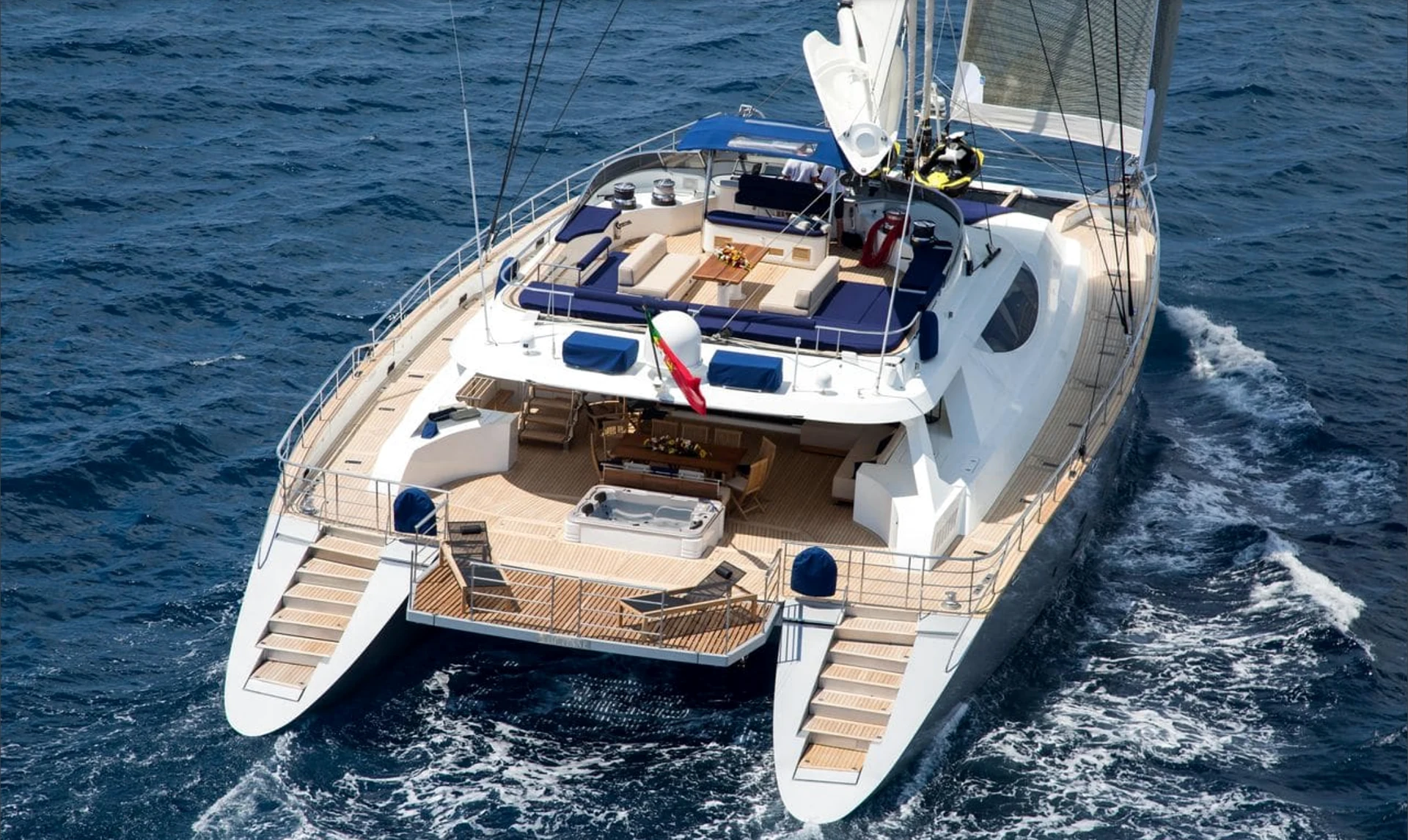 Sailing catamaran photographed from above while underway