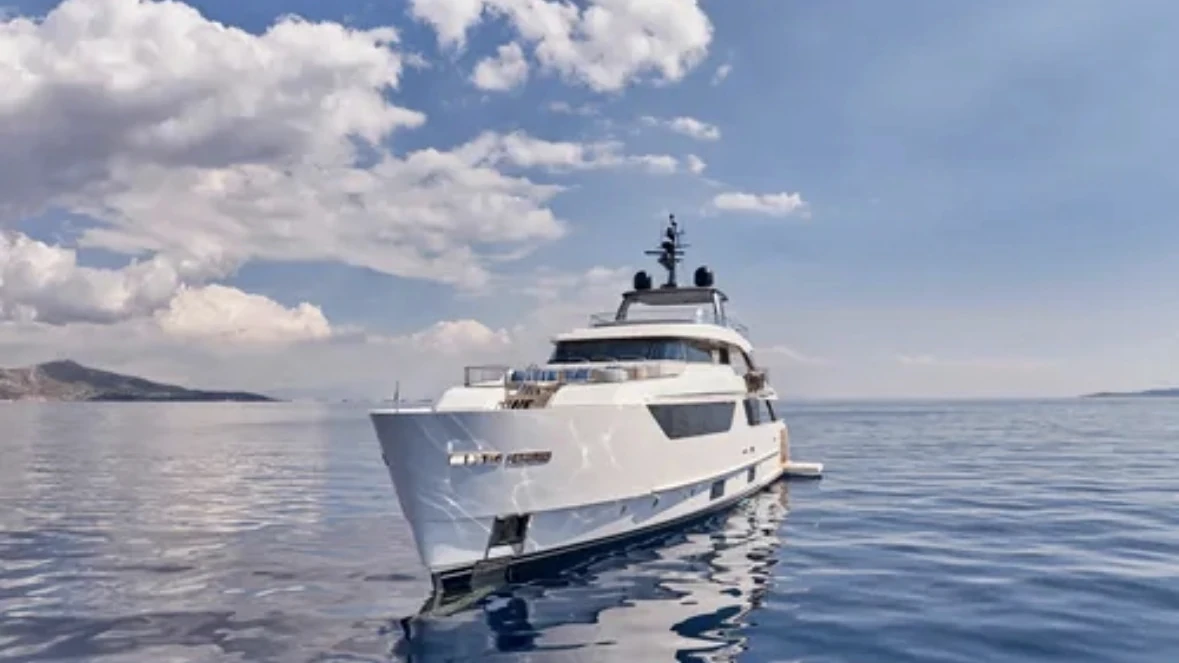 Private motor yacht at rest on calm Mediterranean water